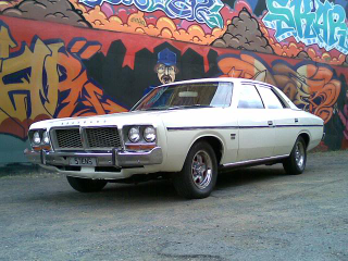 Illustration for article titled Completely random... Aussie Chryslers with Oldsmobile wheels?